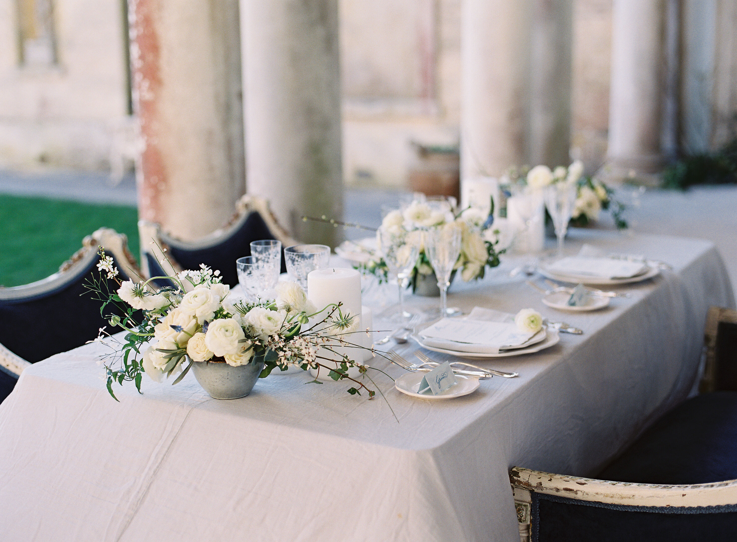 Romantic tablescape with Spring flowers for Somerley House wedding inspiration. Photo by Camilla Arnhold